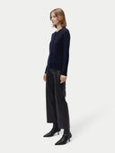 Women's Pure Cashmere Crew Neck Cardigan Navy Blazer worn by model, side view, on white background