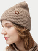 Unisex Organic Cashmere Rib Knit Beanie Taupe worn by model, detail view on white background
