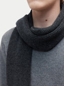 Unisex Cashmere Fisherman Knit Scarf Charcoal worn by model, detail view on white background
