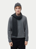 Unisex Cashmere Fisherman Knit Scarf Charcoal worn by model, detail view on white background