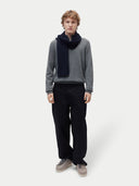 Unisex Cashmere Fisherman Knit Scarf Navy Blazer worn by model, detail view on white background