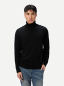 Men's Black Turtleneck Cashmere Sweater worn by model, detail view on white background