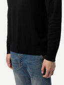 Men's Black Turtleneck Cashmere Sweater worn by model, detail view on white background