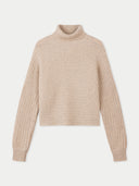 A cropped ribbed-knit turtleneck sweater in a light beige color, displayed against a solid off-white background. #color_duty-beige