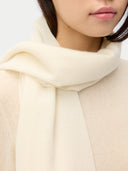 Organic Colour Cashmere Woven Scarf Off White worn by model, detail view on white background