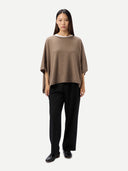 Women's Taupe Cashmere  Knitted Poncho worn by model, front view, on white background