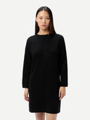 Women's Seamless Crewneck Cashmere Dress Black worn by model detail view on white background