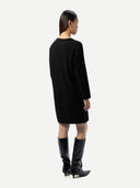 Women's Seamless Crewneck Cashmere Dress Black worn by model back view on white background