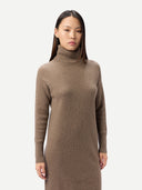 Women's  Seamless Turtleneck Cashmere Dress Taupe worn by model detail view on white background