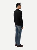 Men Cashmere Silk High Neck  Sweater Black worn by model, back view on white background