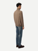 Men's Taupe Turtleneck Cashmere Sweater worn by model, back view on white background