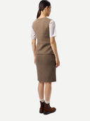 Woman wearing a brown knit cashmere top and skirt with white sleeves on a white background  #color_taupe