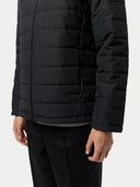 Men's CashmereTECH Jacket Black worn by model, detail view on white background