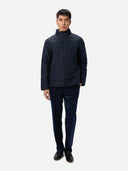 Men's CashmereTECH Jacket Navy Blazer worn by model, front view on white background #color_navy