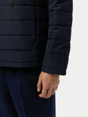 Men's CashmereTECH Jacket Navy Blazer worn by model, detail view on white background #color_navy