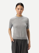 Women's Short-Sleeve Cashmere Sweater Grey worn by model, detail view on white background