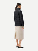 Women's CashmereTECH Jacket Black worn by model, back view on white background