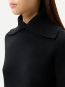 Women's Fold-Over Turtleneck Cashmere Sweater Black worn by model, detail view on white background