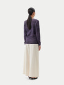 Purple cashmere sweater on a light gray background #color_soft-white