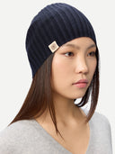 Cashmere Rib Knit Hat Navy Blazer worn by model side view on white background