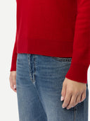 Timeless Cashmere Turtleneck Sweater Chili Pepper  worn by model, detail view, on white background