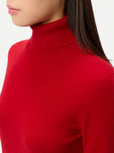 Timeless Cashmere Turtleneck Sweater Chili Pepper  worn by model, detail view, on white background