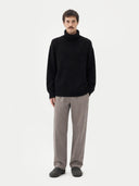 Men's Cashmere Turtleneck Black worn by model, front view on white background