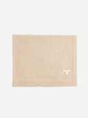 Beige fabric envelope with a logo on a white background