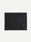Natural Color Cashmere Knit Blanket in charcoal, folded.
