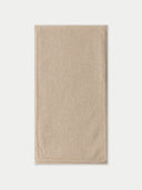 A rectangular beige scarf or wrap with a fine knit texture, laid flat against a clean white background.