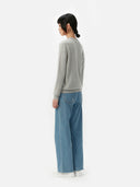 Women's Grey Cashmere Crewneck Cardigan worn by model, side view on white background
