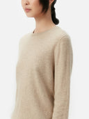 Women's Warm Grey Cashmere Crew Neck Sweater worn by model, front view on white background
