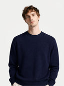 Men's Navy Crewneck Cashmere Sweater worn by model, detail view on white background
