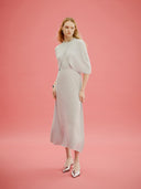 A model is wearing sleeveless cashmere Capelet  #color_ice-flow #color_ice-flow