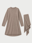 A taupe knit long-sleeve tunic dress with a matching folded scarf, displayed on a light gray background.