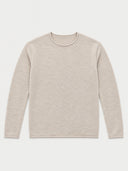 A light beige long-sleeve crewneck sweater, laid flat against a light gray background.