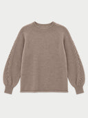 A taupe knit sweater with distinctive cable-knit detailing running down the sleeves, shown flat on a light gray background.