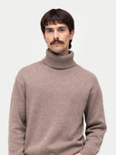 Men's Cashmere Turtleneck Taupe worn by model, detail view on white background