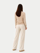 Women's Warm Grey Cashmere Mock Neck Sweater worn by model, front view on white background