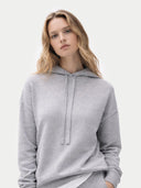 Women's Cashmere Pullover Hoodie High Rise worn by model, detail view on white background