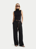 Women's Black Cashmere Silk High-Neck Top worn by model, front view on white background