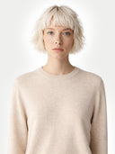Women's Birch White Cashmere Crewneck Sweater worn by model, detail view on white background