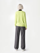 Women's Sunny Lime Cashmere Crewneck Sweater worn by model, back view on white background 