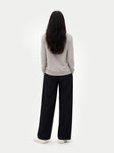 Women's Grey Cashmere V-Neck Cardigan worn by model, back view on white background