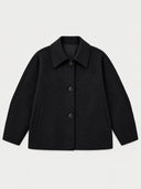 A black long-sleeve coat with a pointed collar and three front buttons, displayed flat against a light gray background.