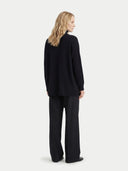 Women's Black Cashmere Open-Front Cardigan worn by model, back view on white background