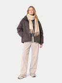 Cashmere Fringed Scarf Beige worn by model, front view on white background