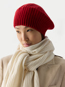 Textured Knit Beret Chili Pepper worn by model, side view on white background

