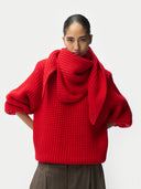 Women wearing a red knitted cashmere sweater and scarf on a white background #color_fiery-red