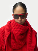 Women wearing a red knitted cashmere sweater and scarf on a white background #color_fiery-red